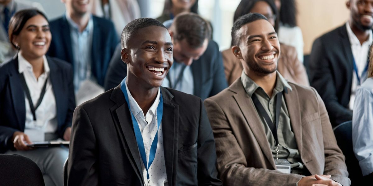 Shot of a group of businesspeople attending a conference